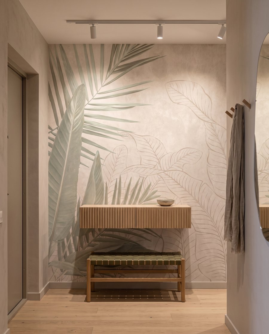 Folhas tropicais desenhadas num interior