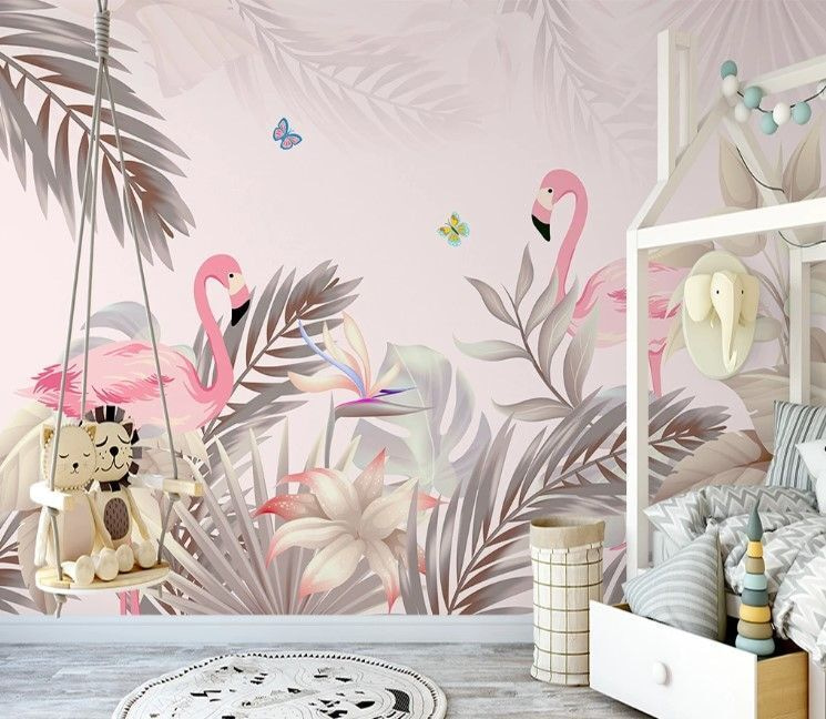 Flamingos entre folhas suaves num interior