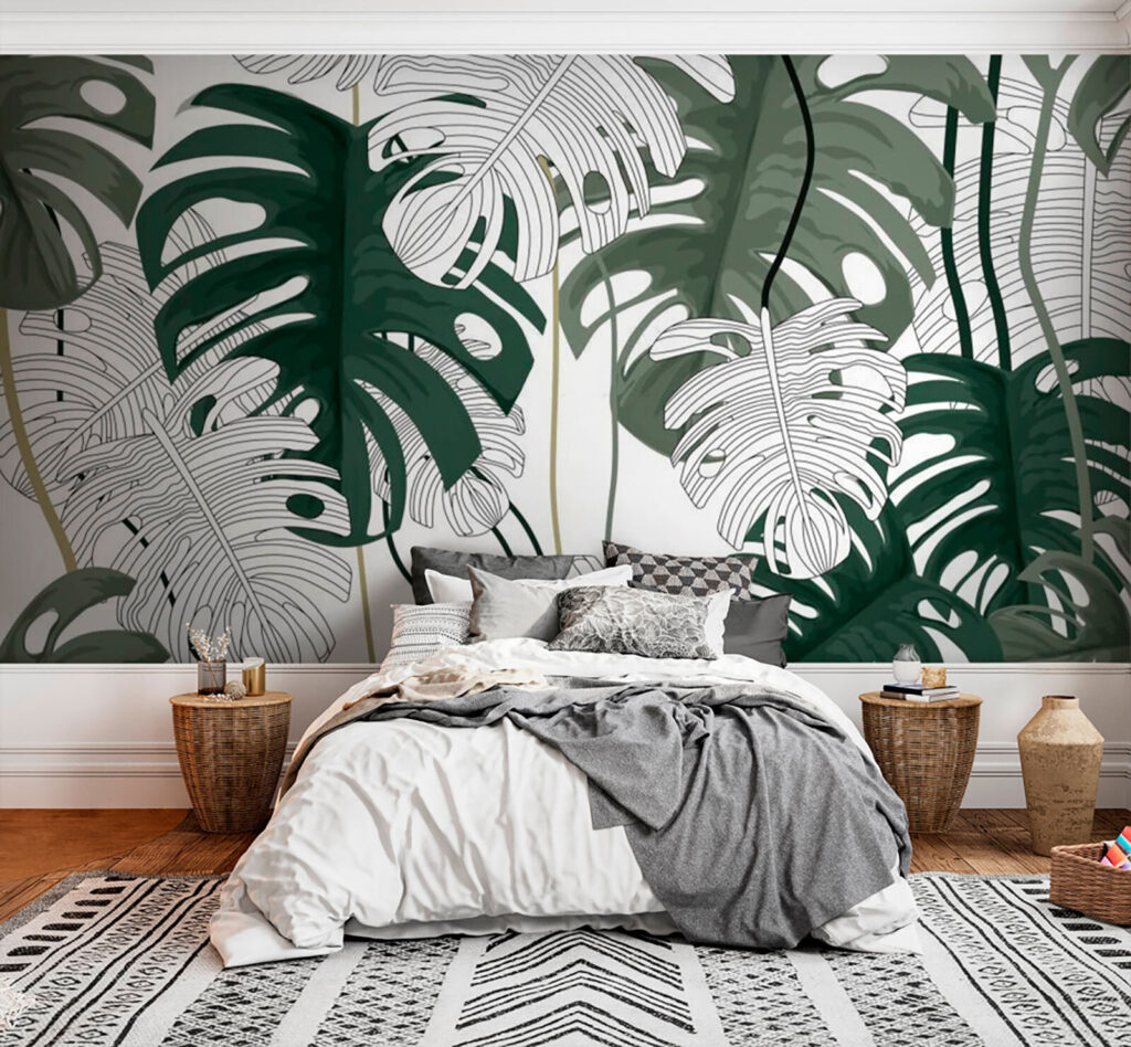 Folhas verdes sobre branco num interior
